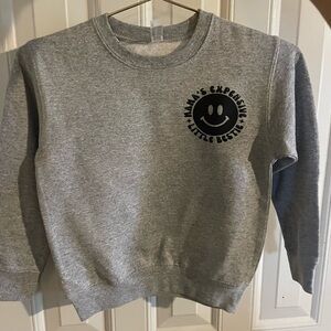 Gray Sweatshirt with Smiley Face Graphic